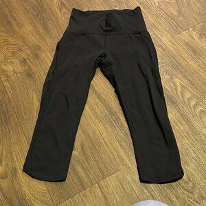 Lululemon black Train‎ Times Crop (17") workout pants.